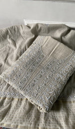 Load image into Gallery viewer, ivory chikankari set folded, worked panel on top