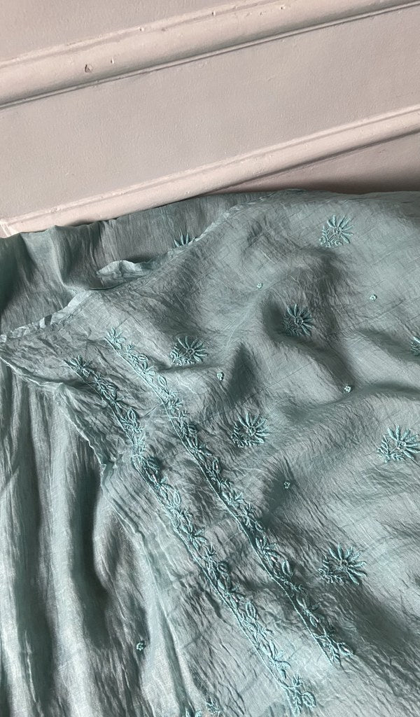border and hem work on aqua pure mul chanderi
