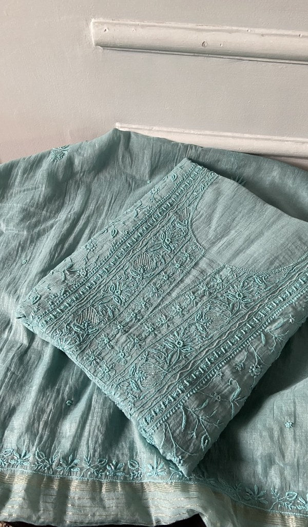 aqua chikankari set folded, worked panel on top