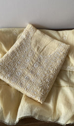 Yellow pure mul chanderi kurta piece folded, fine jaaldar chikankari