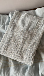 The folded set again, gala and placket in view