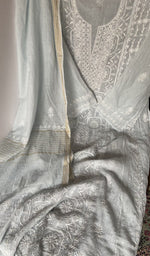 Beads and cutdana along the placket
