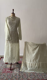 The set on the mannequin with its dupatta beside it