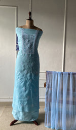 The set on the mannequin with its dupatta beside it