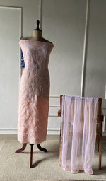 The set on the mannequin with its dupatta beside it