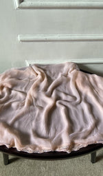 Bottom fabric draped over the stool