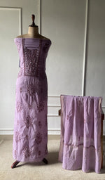 The set on the mannequin with its dupatta beside it
