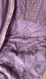 Beads and cutdana along the placket