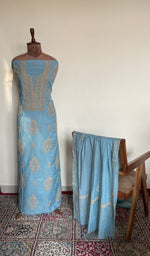 The set on the mannequin with its dupatta beside it