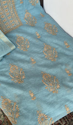 Kurta laid flat with the dupatta, do taar and teen taar chikankari
