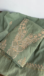Sage green mul chanderi kurta piece folded, gala work in front