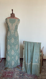 The set on the mannequin with its dupatta beside it