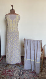 The set on the mannequin with its dupatta beside it