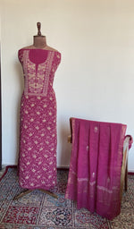 The set on the mannequin with its dupatta beside it