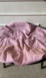 Bottom fabric draped over the stool