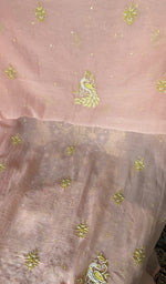 Hem and border of the pink dupatta