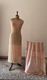 Pink pure mul chanderi chikankari suit set on the mannequin with its dupatta