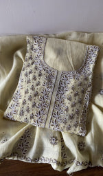 Folded kurta piece and dupatta, chikankari along the hem