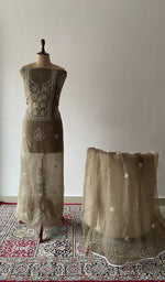 The set on the mannequin with its dupatta beside it