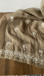 The kurta piece folded on the carpet