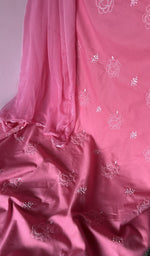 Motifs across the body of the pink kurta