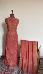 Rust mul chanderi set on the mannequin with its dupatta