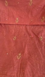 Close view of the rust kurta fabric