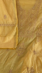 Mustard mul chanderi laid flat on the table