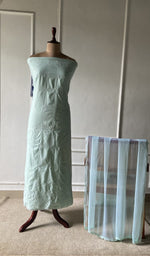 The set on the mannequin with its dupatta beside it