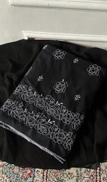 black cotton chikankari suit set, folded
