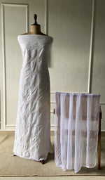 The set on the mannequin with its dupatta beside it