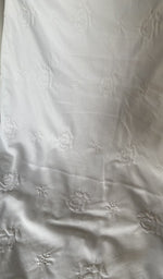 fine chikankari across the body of the kurta