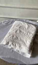 The folded set, kurta on top
