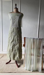 The set on the mannequin with its dupatta beside it