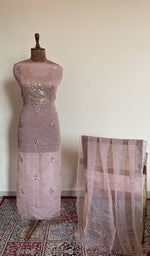 Dusty rose organza silk set on the mannequin with its dupatta