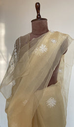 Fine do taar chikankari on border and palla on the butter yellow saree