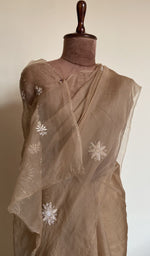 Camel beige saree on the mannequin, close view