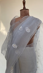 Fine do taar chikankari on border and palla on the powder blue saree