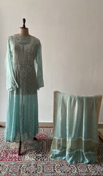 The set on the mannequin with its dupatta beside it