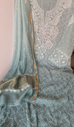 Beads and cutdana along the placket