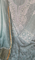 Resham thread through the motifs
