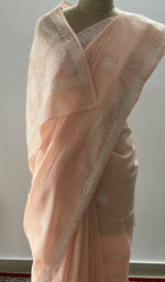 fine chikankari across the drape