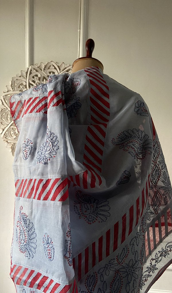 Close view of the stitchwork on the grey blue saree