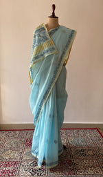 Light Blue cotton voile chikankari saree draped on the mannequin