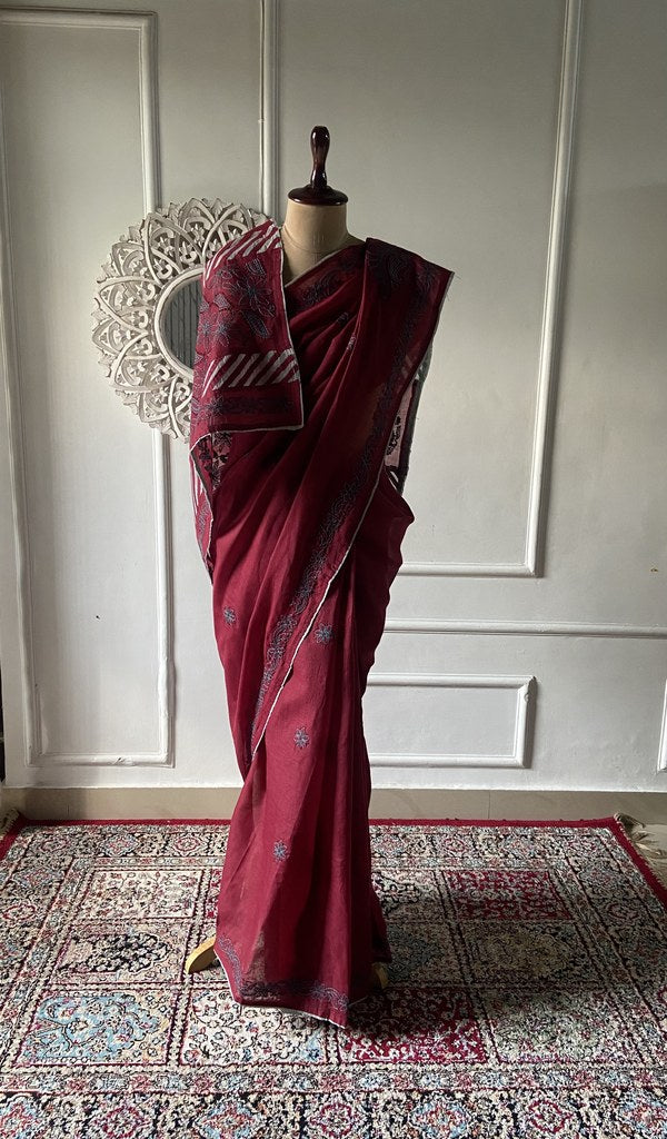 Maroon cotton voile chikankari saree draped on the mannequin