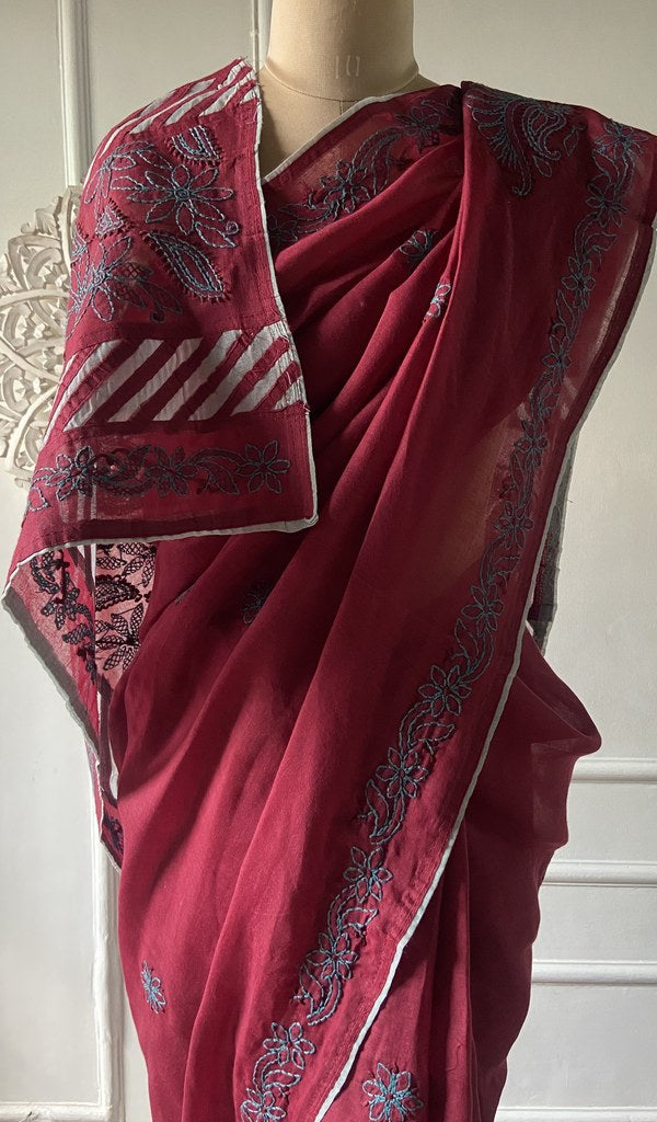 Border detail on the maroon cotton voile saree