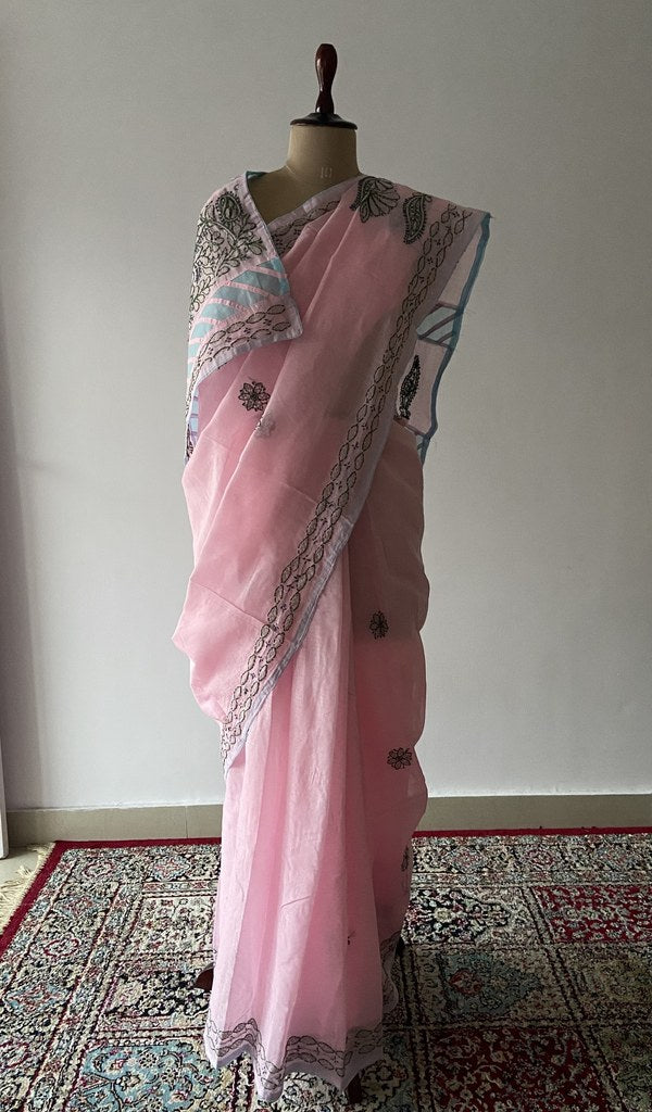 Pink cotton voile chikankari saree draped on the mannequin