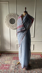 Load image into Gallery viewer, Grey cotton voile chikankari saree draped on the mannequin