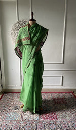 Load image into Gallery viewer, Green cotton voile chikankari saree draped on the mannequin