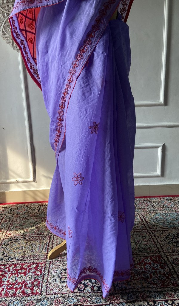Pallu folded over the shoulder, work visible